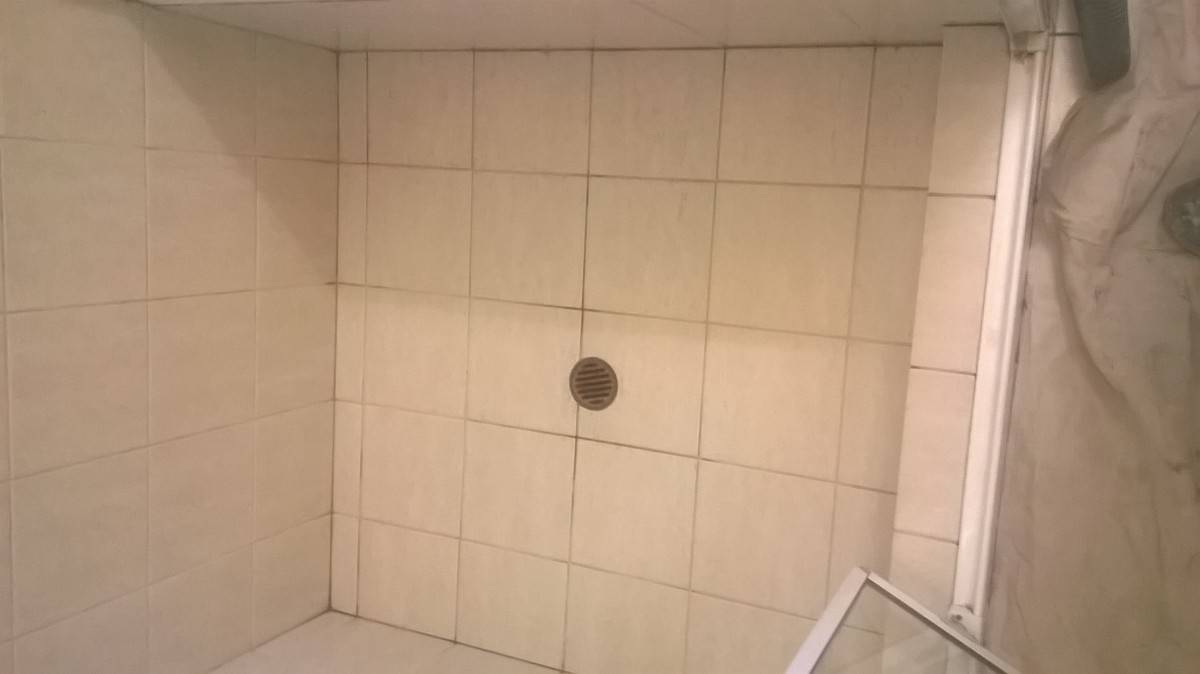 before epoxy grout in shower
