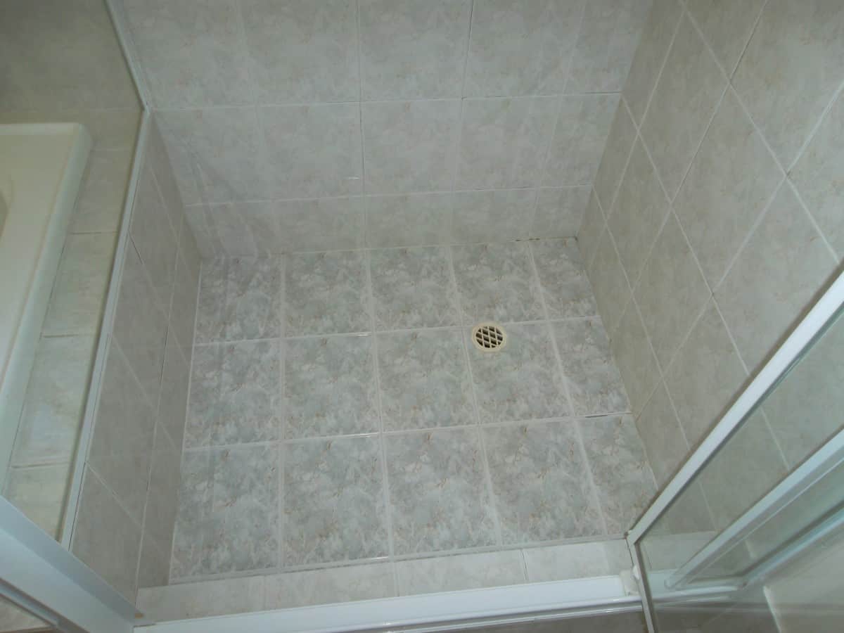 before sealing shower tiles